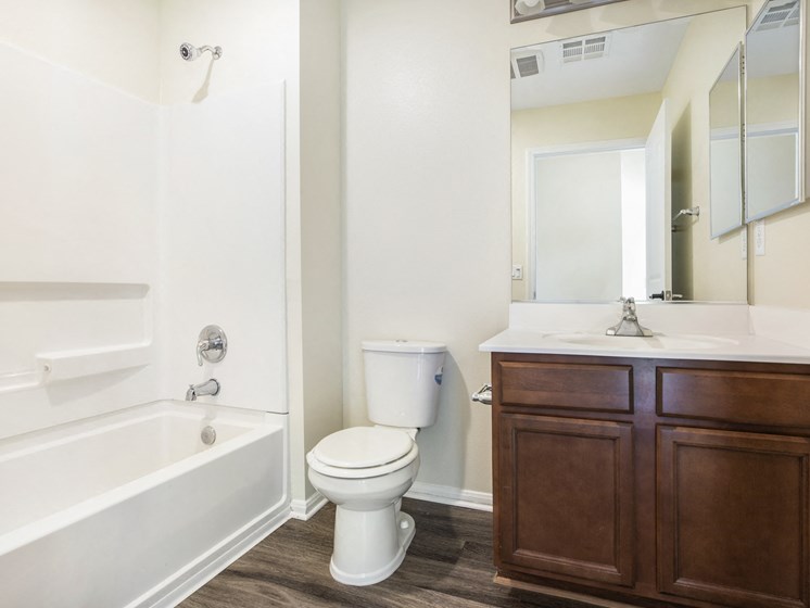 Parkside Villas bathroom vanity, toilet, and shower